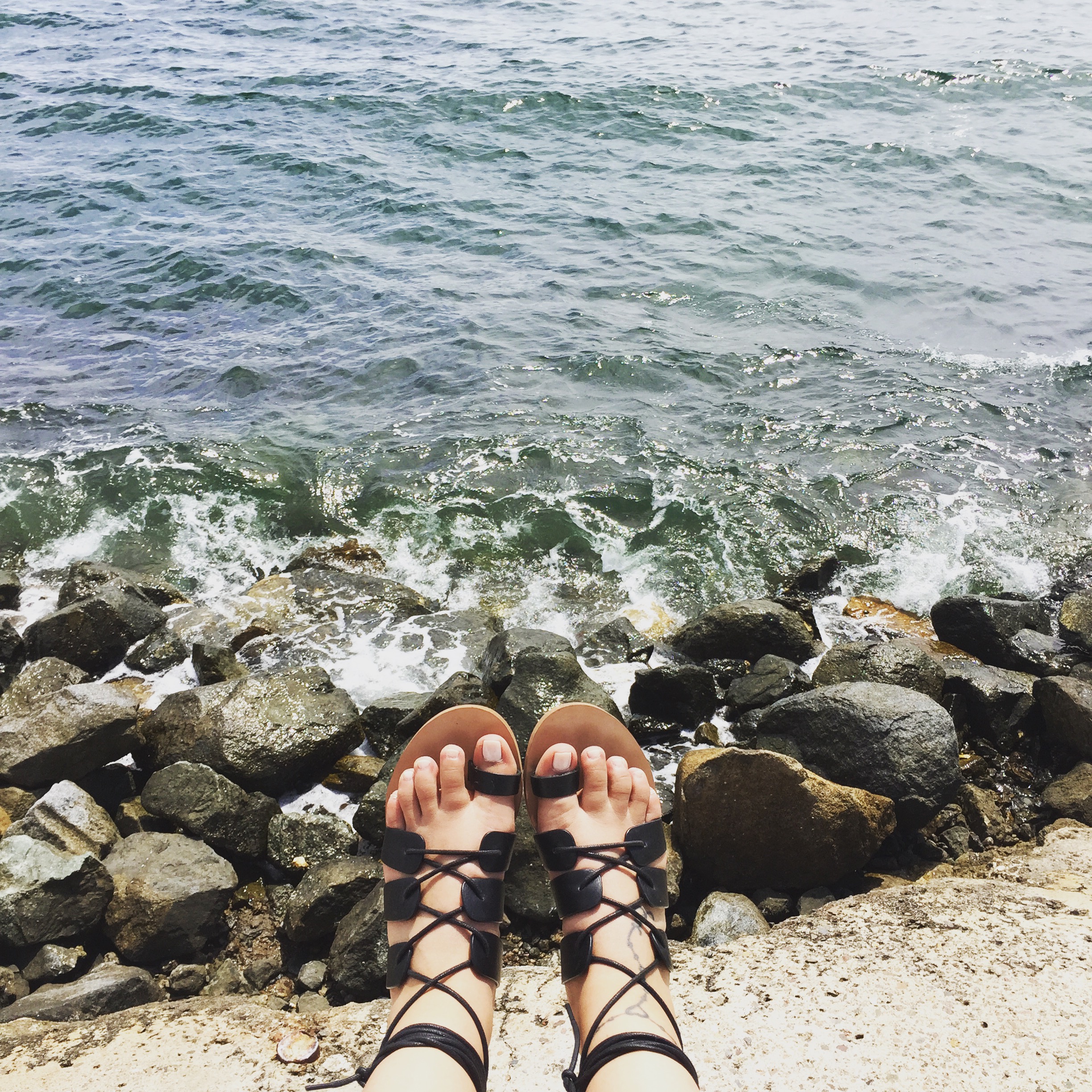 feet by the water
